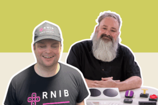 Against a two-tone backdrop&mdash;green on top and beige below&mdash;are images of SightlessKombat, a white Blind man wearing an RNIB-branded cap, and Bryce Johnson, a white man with a grey beard. Bryce is dressed in a black t-shirt and sits in front of an Xbox Adaptive Controller.